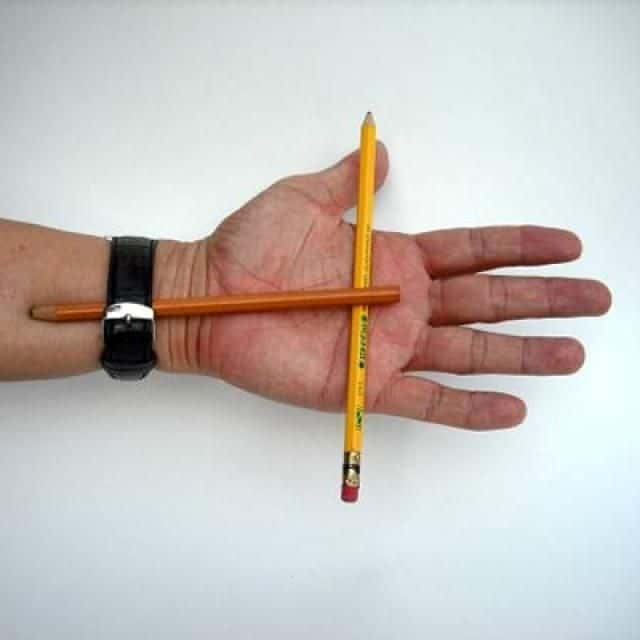 Sticking pencil magic trick
